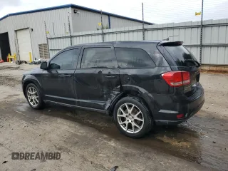 2013 Dodge Journey R/T with VIN 3C4PDDEG7DT677135, listed as a Copart auction lot 60256295 with 190,387 mi miles and Salvage title. Bid and sale history available at DreamBid. Image 2.