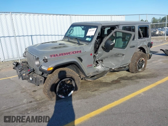 2020 Jeep Wrangler Unlimited Rubicon with VIN 1C4HJXFN4LW136516, listed as a IAAI auction lot 41874403 with 87,576 mi miles. Bid and sale history available at carsss.com. Image 17.