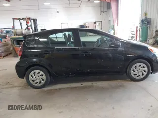 2016 Toyota Prius c One with VIN JTDKDTB3XG1124674, listed as a IAAI auction lot 41976438 with 72,028 mi miles. Bid and sale history available at carsss.com. Image 13.