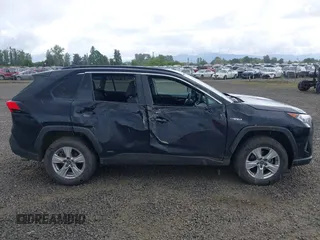 2020 Toyota RAV4 Hybrid XLE z VIN 2T3RWRFV3LW064403, wystawiony jako IAAI lot #42297370 z przebiegiem 102 730 mil mil oraz . Historia ofert i sprzedaży dostępna na DreamBid. Obrazek 13.