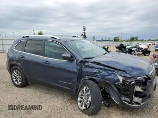 2019 Jeep Cherokee Latitude Plus z VIN 1C4PJMLX2KD371491, wystawiony jako Copart lot #58732495 z przebiegiem 22 748 mil mil oraz Szkoda całkowita • Salvage title. Historia ofert i sprzedaży dostępna na DreamBid. Obrazek 4.