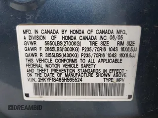 2005 Honda Pilot EX with VIN 2HKYF18465H565524, listed as a IAAI auction lot 41927812 with 218,637 mi miles. Bid and sale history available at carsss.com. Image 9.