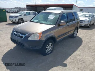 2004 Honda CR-V EX with VIN JHLRD78874C005539, listed as a IAAI auction lot 42013679 with 146,734 mi miles and . Bid and sale history available at carsss.com. Image 2.