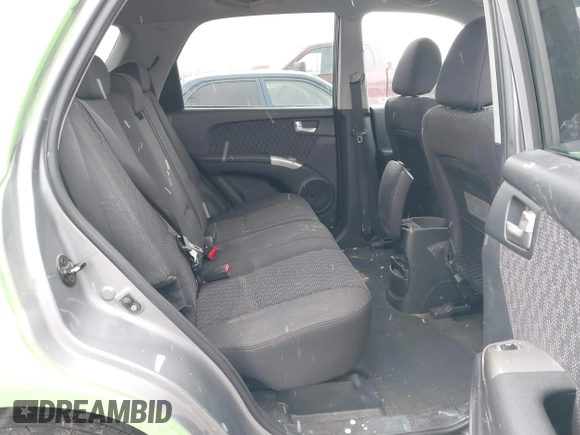 2008 Kia Sportage LX with VIN KNDJE723287471835, listed as a IAAI auction lot 41268401 with 200,404 mi miles and . Bid and sale history available at DreamBid. Image 8.