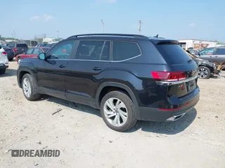 2021 Volkswagen Atlas SE with VIN 1V2HR2CA2MC580752, listed as a IAAI auction lot 42701057 with 69,811 mi miles and . Bid and sale history available at DreamBid. Image 3.