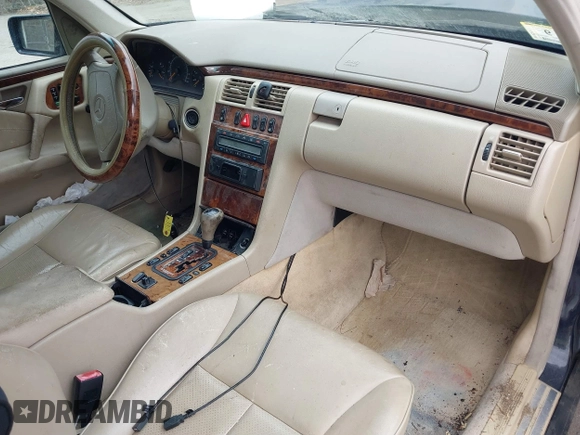 1999 Mercedes-Benz E-Class with VIN WDBJF82H3XX025608, listed as a IAAI auction lot 41606211 with 182,293 mi miles. Bid and sale history available at carsss.com. Image 5.