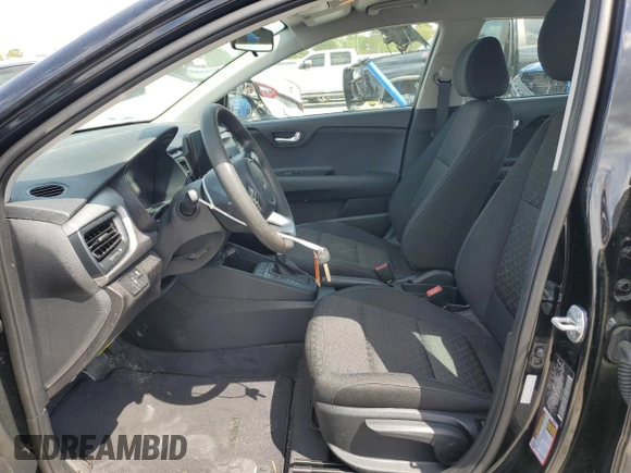 2023 Kia Rio LX with VIN 3KPA24AD7PE576869, listed as a Copart auction lot 50861285 with 18,044 mi miles and Salvage Title. Bid and sale history available at DreamBid. Image 7.