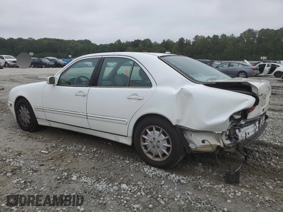 2000 Mercedes-Benz E-Class with VIN WDBJF70J1YB078418, listed as a Copart auction lot 71177244 with 189,838 mi miles and Salvage Title. Bid and sale history available at carsss.com. Image 2.