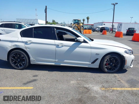 2023 BMW 5 Series 530e with VIN WBA13AG09PCM41820, listed as a IAAI auction lot 42409541 with 17,715 mi miles and . Bid and sale history available at DreamBid. Image 12.