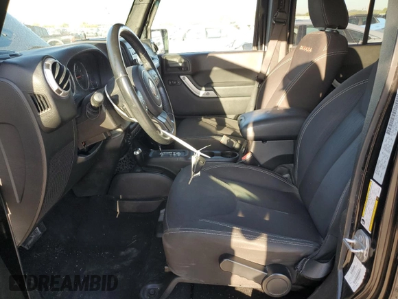 2015 Jeep Wrangler Unlimited Sahara with VIN 1C4BJWEG2FL690498, listed as a Copart auction lot 73598124 with 143,564 mi miles and Salvage Title. Bid and sale history available at carsss.com. Image 7.