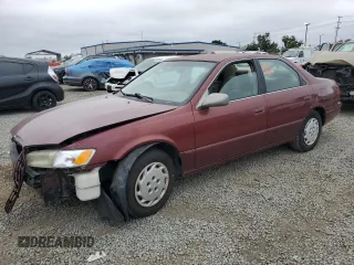 1999 Toyota Camry LE z VIN 4T1BG22K0XU439146, wystawiony jako Copart lot #59541595 z przebiegiem 146 830 mil mil oraz Szkoda całkowita • Salvage title. Historia ofert i sprzedaży dostępna na DreamBid. Obrazek 1.