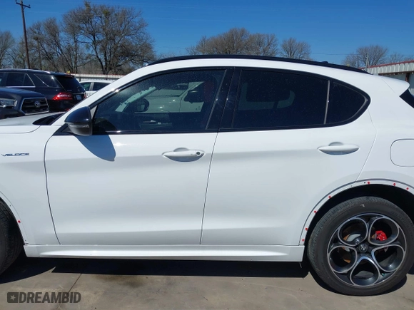 2023 Alfa Romeo Stelvio Ti with VIN ZASPAKBN4P7D63524, listed as a IAAI auction lot 41626631 with 37,731 mi miles. Bid and sale history available at carsss.com. Image 15.
