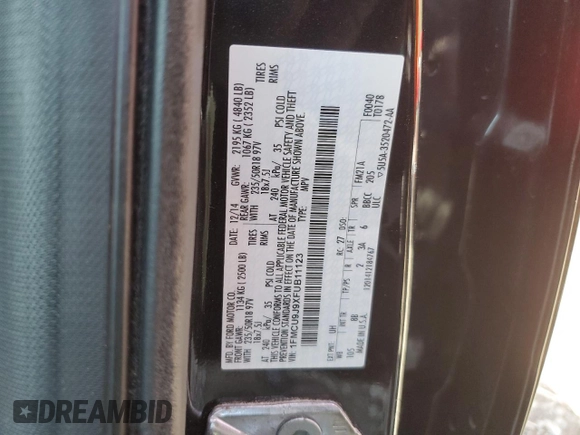 2015 Ford Escape Titanium with VIN 1FMCU9J9XFUB11123, listed as a Copart auction lot 52191015 with 77,541 mi miles and Salvage Title. Bid and sale history available at carsss.com. Image 16.