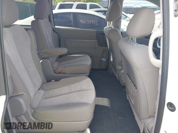 2014 Kia Sedona LX with VIN KNDMG4C75E6545483, listed as a IAAI auction lot 42166152 with 121,827 mi miles and . Bid and sale history available at carsss.com. Image 8.