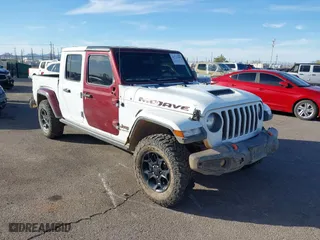2022 Jeep Gladiator Mojave with VIN 1C6JJTEG6NL100383, listed as a IAAI auction lot 40712989 with 35,283 mi miles. Bid and sale history available at carsss.com. Image 1.