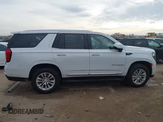 2021 GMC Yukon SLT with VIN 1GKS1BKD1MR489922, listed as a IAAI auction lot 40972652 with 77,791 mi miles. Bid and sale history available at carsss.com. Image 13.