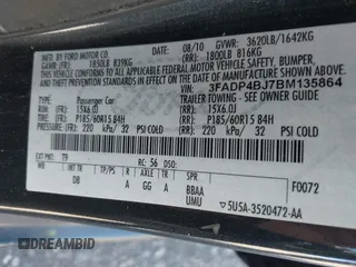 2011 Ford Fiesta SE with VIN 3FADP4BJ7BM135864, listed as a IAAI auction lot 42134479 with 118,573 mi miles. Bid and sale history available at carsss.com. Image 9.