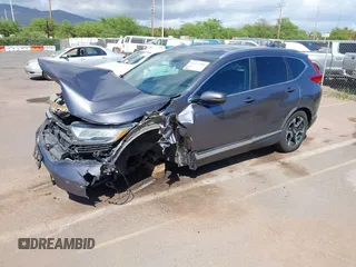 2018 Honda CR-V Touring with VIN 7FARW1H90JE030766, listed as a IAAI auction lot 41637900 with Not Provided miles and . Bid and sale history available at DreamBid. Image 18.