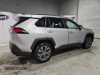 2022 Toyota RAV4 Hybrid XLE Premium with VIN 4T3B6RFV1NU080099, listed as a Copart auction lot 60206905 with 59,859 mi miles and Clean title. Bid and sale history available at DreamBid. Image 3.