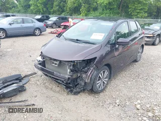 2015 Honda Fit EX z VIN 3HGGK5G80FM751625, wystawiony jako IAAI lot #42427480 z przebiegiem 109 657 mil mil oraz . Historia ofert i sprzedaży dostępna na DreamBid. Obrazek 21.