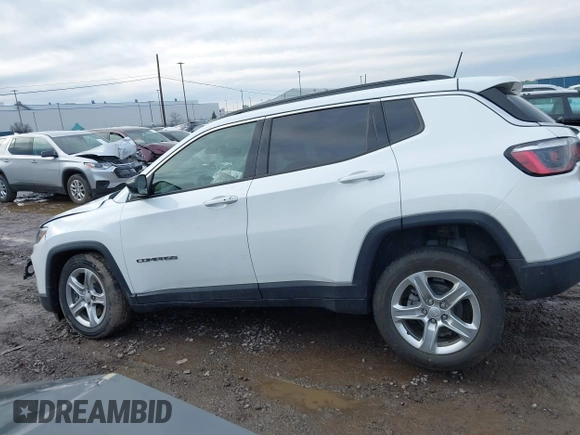 2023 Jeep Compass Latitude with VIN 3C4NJDBN6PT556992, listed as a IAAI auction lot 41226965 with 22,300 mi miles and . Bid and sale history available at DreamBid. Image 14.