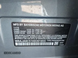 2019 BMW 5 Series 530e iPerformance with VIN WBAJA9C51KB391855, listed as a IAAI auction lot 41429622 with 47,162 mi miles. Bid and sale history available at carsss.com. Image 9.