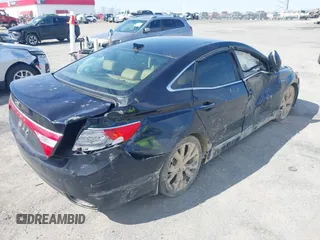 2013 Hyundai Azera with VIN KMHFH4JG6DA233205, listed as a IAAI auction lot 41643389 with 200,842 mi miles and . Bid and sale history available at carsss.com. Image 6.