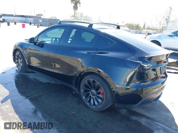 2021 Tesla Model Y Performance with VIN 5YJYGDEF9MF251738, listed as a IAAI auction lot 41708950 with 61,248 mi miles and . Bid and sale history available at DreamBid. Image 3.