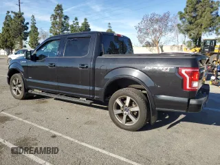 2015 Ford F-150 XLT with VIN 1FTEW1EP9FKE90564, listed as a Copart auction lot 50532105 with 123,494 mi miles and Salvage title. Bid and sale history available at DreamBid. Image 2.