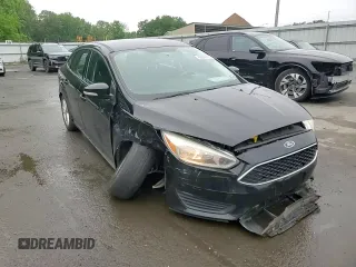2016 Ford Focus SE z VIN 1FADP3F26GL340954, wystawiony jako Copart lot #60989915 z przebiegiem 26 052 mil mil oraz Szkoda całkowita • Salvage title. Historia ofert i sprzedaży dostępna na DreamBid. Obrazek 13.