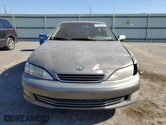2000 Lexus ES 300 with VIN JT8BF28GXY5091263, listed as a Copart auction lot 61767595 with 250,041 mi miles and Salvage title. Bid and sale history available at DreamBid. Image 5.