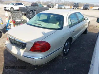 2002 Lincoln Continental with VIN 1LNHM97V02Y600322, listed as a IAAI auction lot 41714349 with 226,142 mi miles and . Bid and sale history available at DreamBid. Image 4.