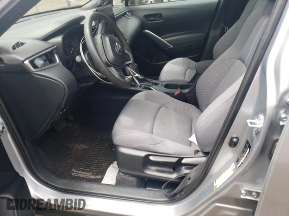 2024 Toyota Corolla Cross Hybrid S z VIN 7MUFBABG5RV034536, wystawiony jako Copart lot #56297535 z przebiegiem 26 655 mil mil oraz Szkoda całkowita • Salvage title. Historia ofert i sprzedaży dostępna na DreamBid. Obrazek 7.
