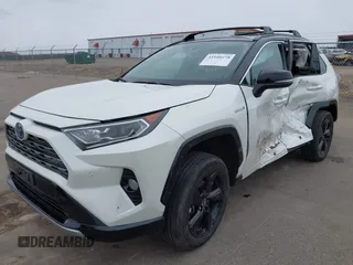 2021 Toyota RAV4 Hybrid XSE with VIN 2T3E6RFV4MW021009, listed as a IAAI auction lot 41940278 with 33,016 mi miles and . Bid and sale history available at DreamBid. Image 17.