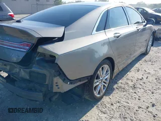 2016 Lincoln MKZ z VIN 3LN6L2G96GR601677, wystawiony jako IAAI lot #42647759 z przebiegiem 87 283 mil mil oraz . Historia ofert i sprzedaży dostępna na DreamBid. Obrazek 13.