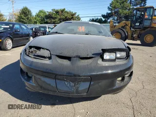 2001 Pontiac Firebird Firebird z VIN 2G2FS22K412122783, wystawiony jako Copart lot #73865114 z przebiegiem 131 320 mil mil oraz Szkoda całkowita • Salvage title. Historia ofert i sprzedaży dostępna na DreamBid. Obrazek 5.