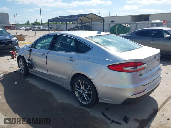 2019 Ford Fusion SEL with VIN 3FA6P0CD2KR116863, listed as a IAAI auction lot 42011256 with 72,676 mi miles. Bid and sale history available at carsss.com. Image 3.
