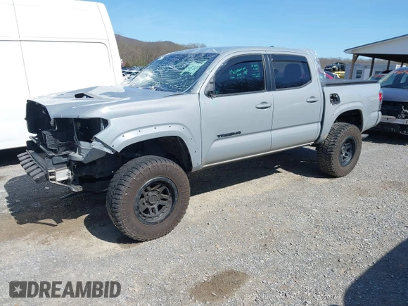 2020 Toyota Tacoma SR5 z VIN 5TFCZ5AN5LX229019, wystawiony jako IAAI lot #41907694 z przebiegiem 79 355 mil mil oraz . Historia ofert i sprzedaży dostępna na DreamBid. Obrazek 23.