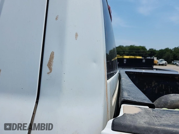 2015 Ram 2500 Tradesman z VIN 3C6TR5CT5FG664005, wystawiony jako IAAI lot #42556122 z przebiegiem 183 397 mil mil oraz . Historia ofert i sprzedaży dostępna na DreamBid. Obrazek 9.