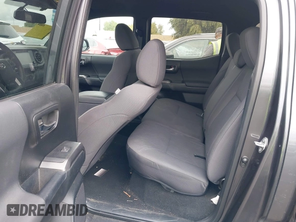 2017 Toyota Tacoma SR5 z VIN 3TMAZ5CN7HM045752, wystawiony jako IAAI lot #42057874 z przebiegiem 89 898 mil mil oraz . Historia ofert i sprzedaży dostępna na DreamBid. Obrazek 8.