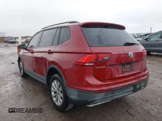 2018 Volkswagen Tiguan S with VIN 3VV1B7AX8JM124827, listed as a IAAI auction lot 41544321 with 101,492 mi miles and . Bid and sale history available at DreamBid. Image 3.