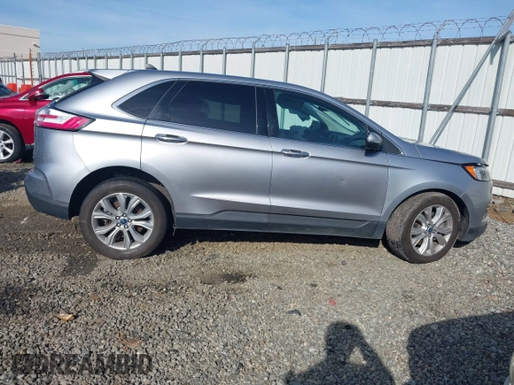2022 Ford Edge Titanium z VIN 2FMPK4K95NBA38997, wystawiony jako IAAI lot #41467300 z przebiegiem 74 310 mil mil oraz . Historia ofert i sprzedaży dostępna na DreamBid. Obrazek 13.
