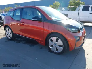 2015 BMW i3 with VIN WBY1Z4C56FV504474, listed as a IAAI auction lot 41449115 with 101,960 mi miles. Bid and sale history available at carsss.com. Image 1.
