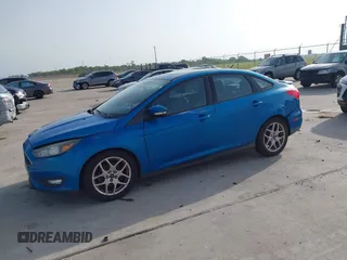 2015 Ford Focus SE with VIN 1FADP3F21FL326927, listed as a IAAI auction lot 42628577 with 112,199 mi miles and . Bid and sale history available at DreamBid. Image 2.
