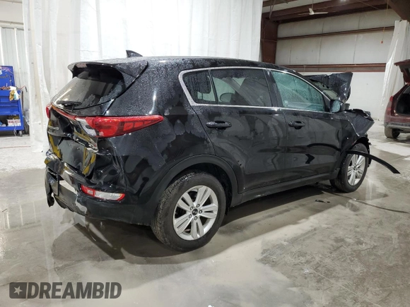 2018 Kia Sportage LX with VIN KNDPM3AC6J7304715, listed as a Copart auction lot 52098735 with 122,934 mi miles and Salvage Title. Bid and sale history available at carsss.com. Image 3.