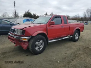 2000 Nissan Frontier XE with VIN 1N6ED26T2YC317714, listed as a Copart auction lot 49154335 with 153,760 mi miles and Salvage title. Bid and sale history available at DreamBid. Image 1.