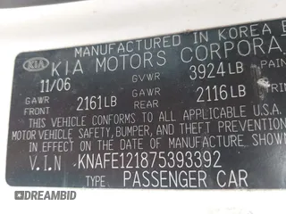 2007 Kia Spectra EX with VIN KNAFE121875393392, listed as a IAAI auction lot 41893653 with 158,913 mi miles. Bid and sale history available at carsss.com. Image 9.