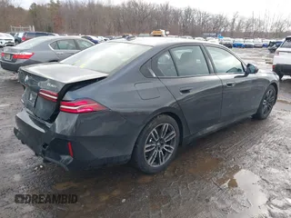 2025 BMW 5 Series 530i xDrive with VIN WBA53FJ01SCT82794, listed as a IAAI auction lot 41575089 with 2,806 mi miles. Bid and sale history available at carsss.com. Image 4.