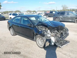 2014 Volkswagen Jetta SE z VIN 3VWD17AJ1EM234437, wystawiony jako IAAI lot #41634352 z przebiegiem 99 232 mil mil oraz . Historia ofert i sprzedaży dostępna na DreamBid. Obrazek 1.