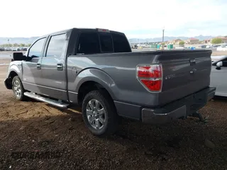 2014 Ford F-150 XL with VIN 1FTFW1CT8EKF75687, listed as a IAAI auction lot 41798973 with 119,972 mi miles. Bid and sale history available at carsss.com. Image 3.